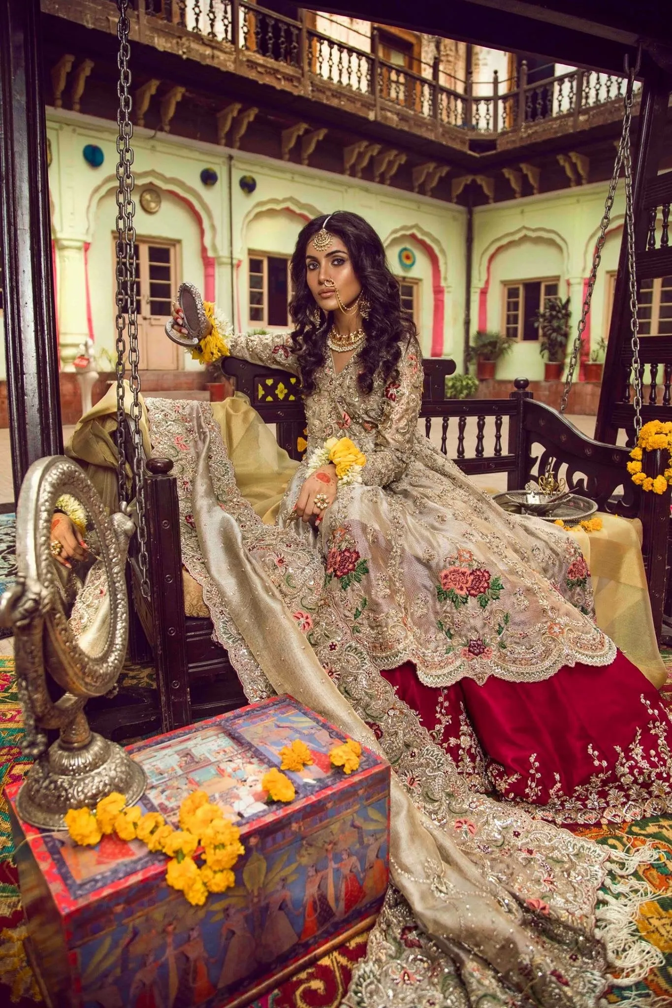 Beutifull bridal lahnga in red and gold with heavy dabka nagh pearls threds and crystals work Model#B 1111