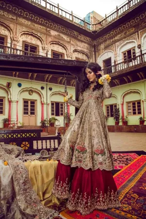 Beutifull bridal lahnga in red and gold with heavy dabka nagh pearls threds and crystals work Model#B 1111