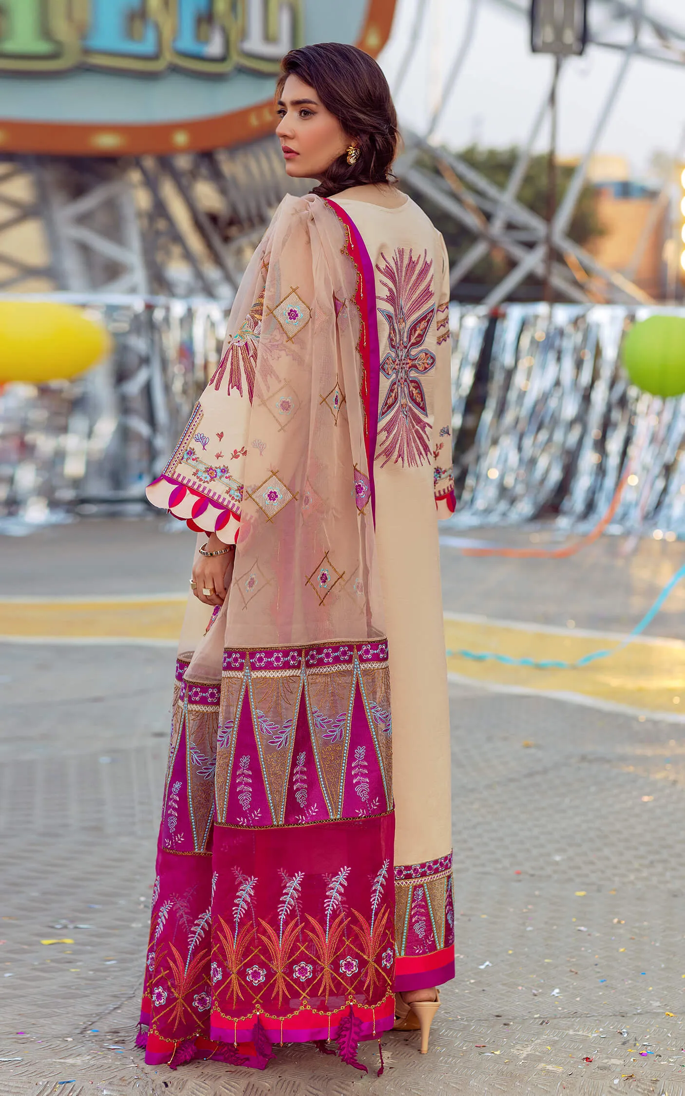 Pakistani Eid Dresses in Printed Peach Salwar Kameez